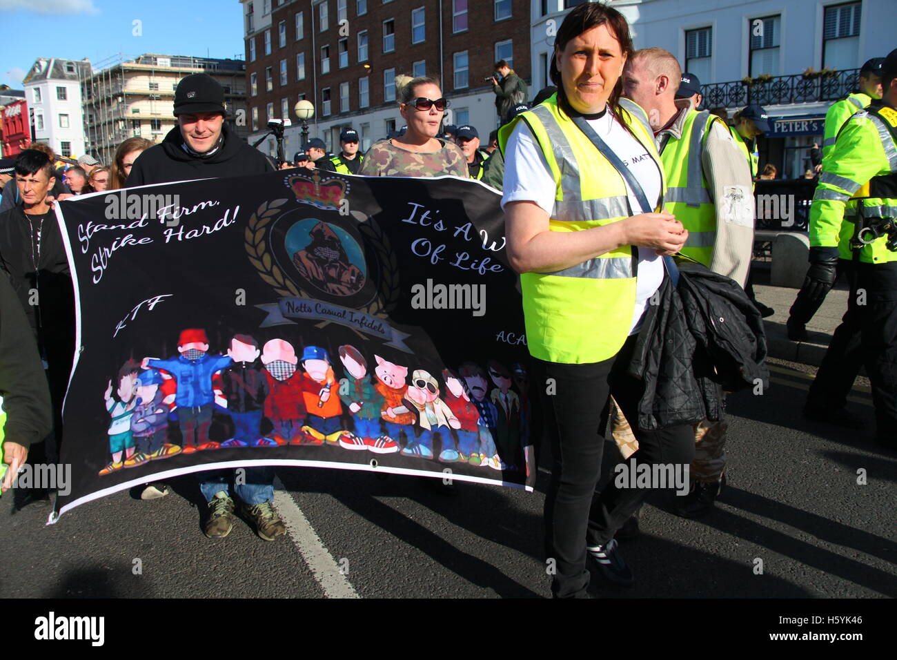 Margate, Kent, UK. 22nd October, 2016. Notts Casual Infidels with their banner. The right wing group White Lives Matter (WLM) march in the town. This is the first WLM demonstration in the UK. A counter demonstration, Margate Rocks Against Racism (MRAR) is taking place in the town at the same time. Penelope Barritt/Alamy Live News Stock Photo