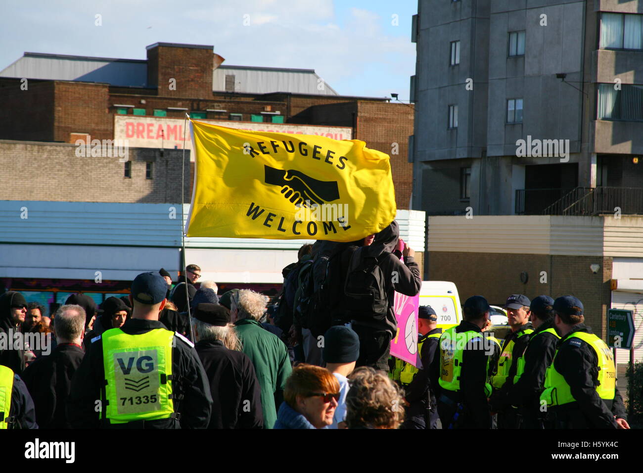 Margate, Kent, UK. 22nd October, 2016. Refugees Welcome flag. The right wing group White Lives Matter (WLM) march in the town. This is the first WLM demonstration in the UK. A counter demonstration, Margate Rocks Against Racism (MRAR) is taking place in the town at the same time. Penelope Barritt/Alamy Live News Stock Photo