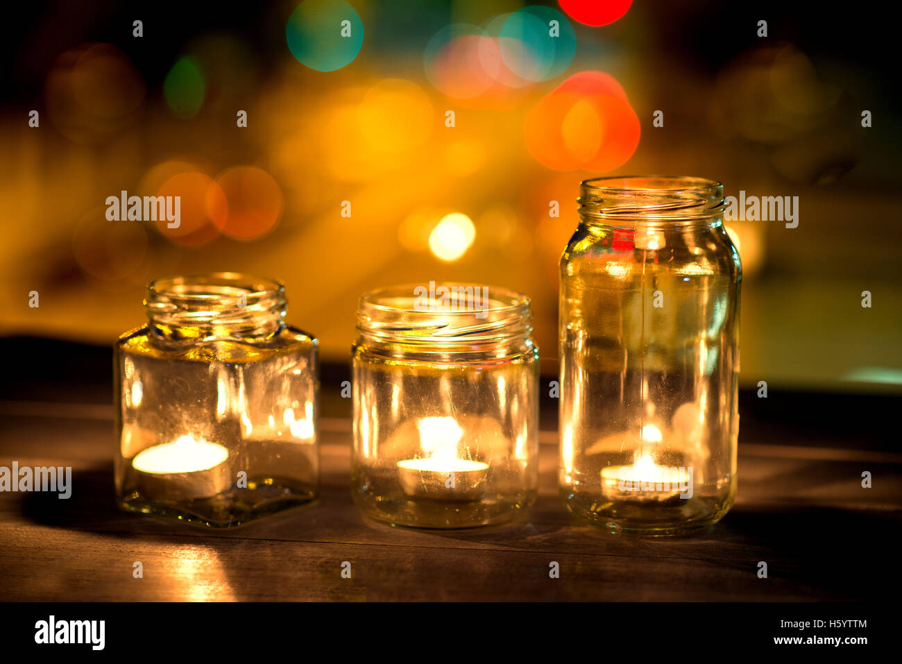Candles lit overnight in a window Stock Photo Alamy