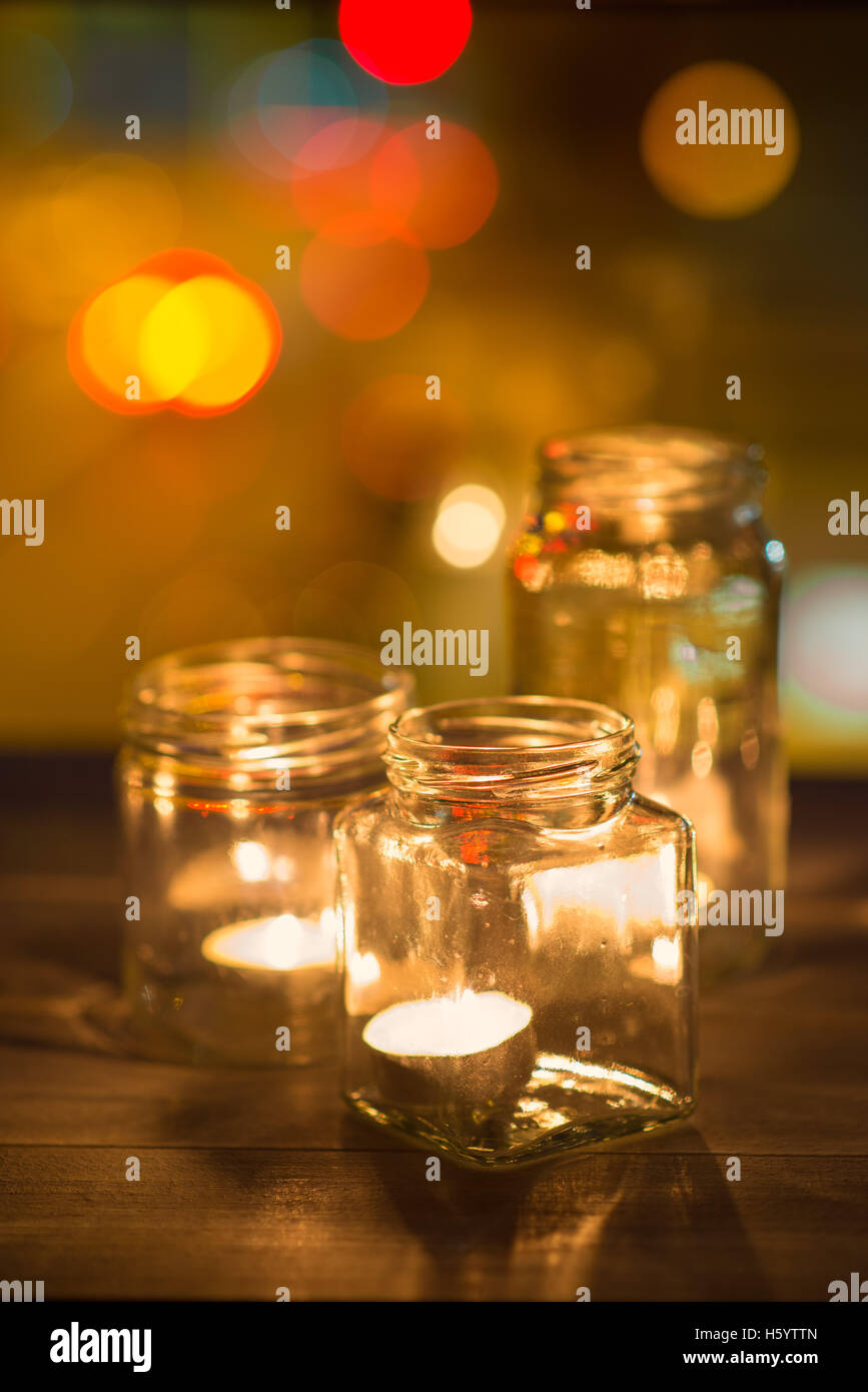 Candles lit overnight in a window Stock Photo Alamy