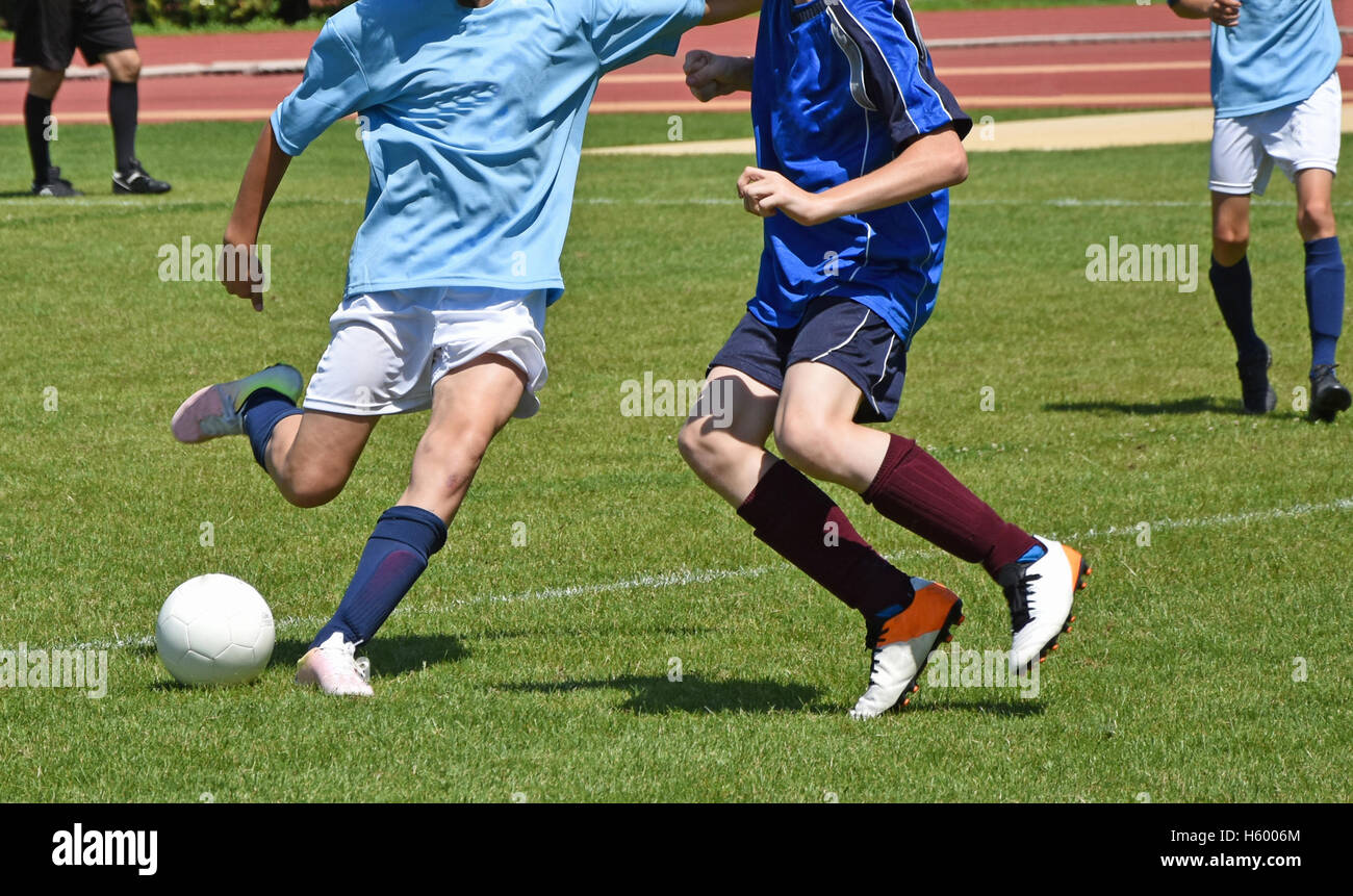 kid-soccer-match-in-summer-stock-photo-alamy