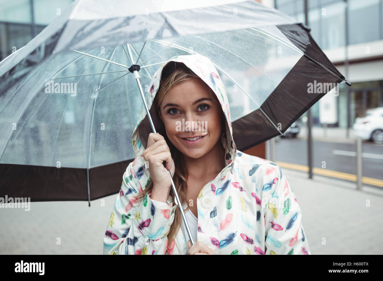 Portrait of beautiful woman holding umbrella Stock Photo