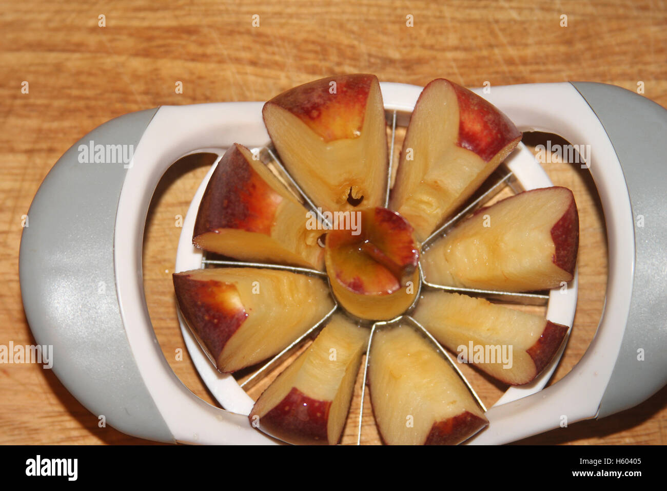 Apple cut with apple cutter Stock Photo Alamy
