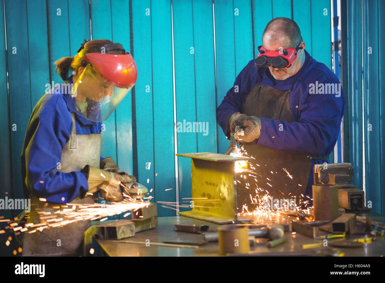 Welders working at work shop Stock Photo Alamy