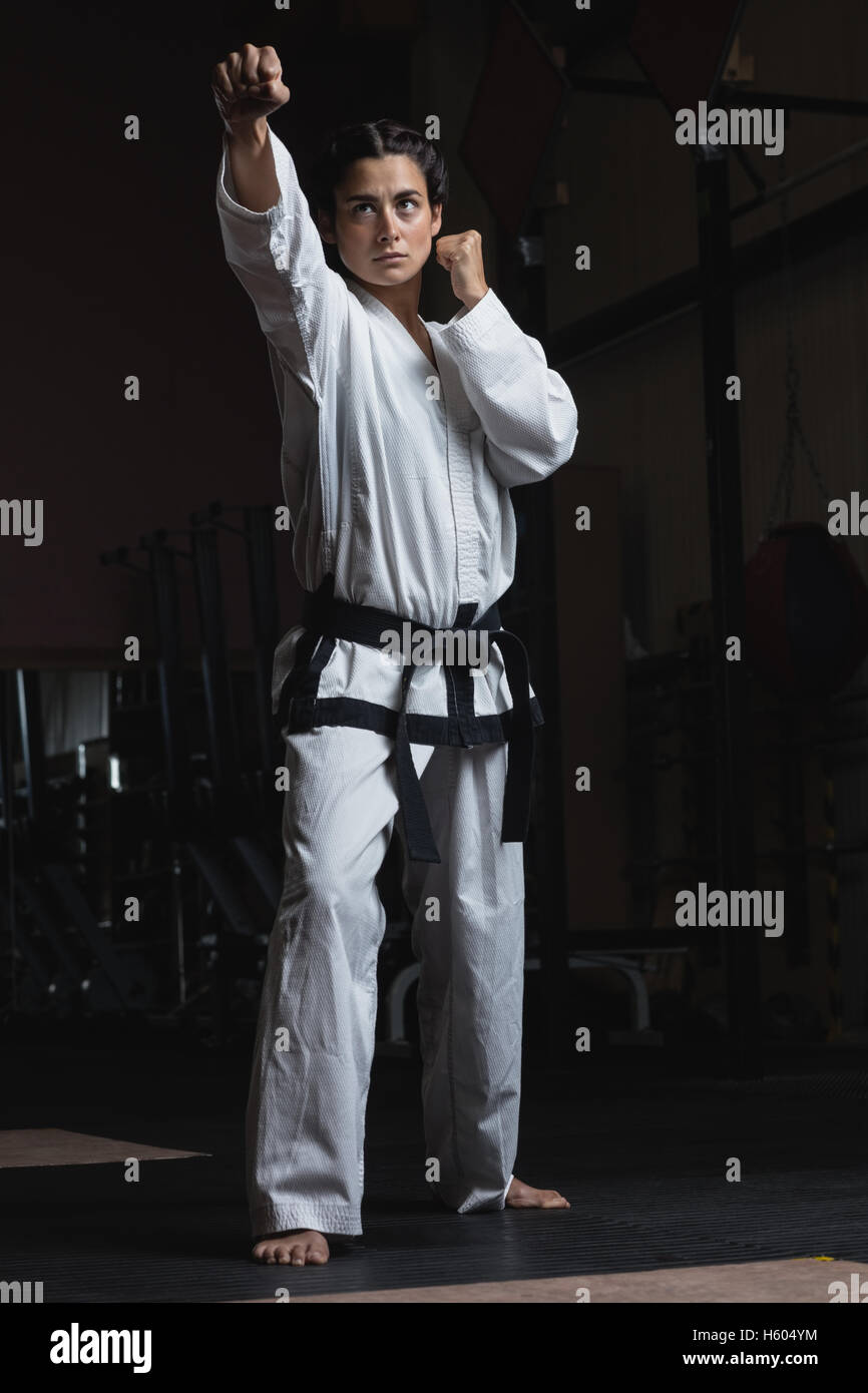 Woman practicing karate Stock Photo