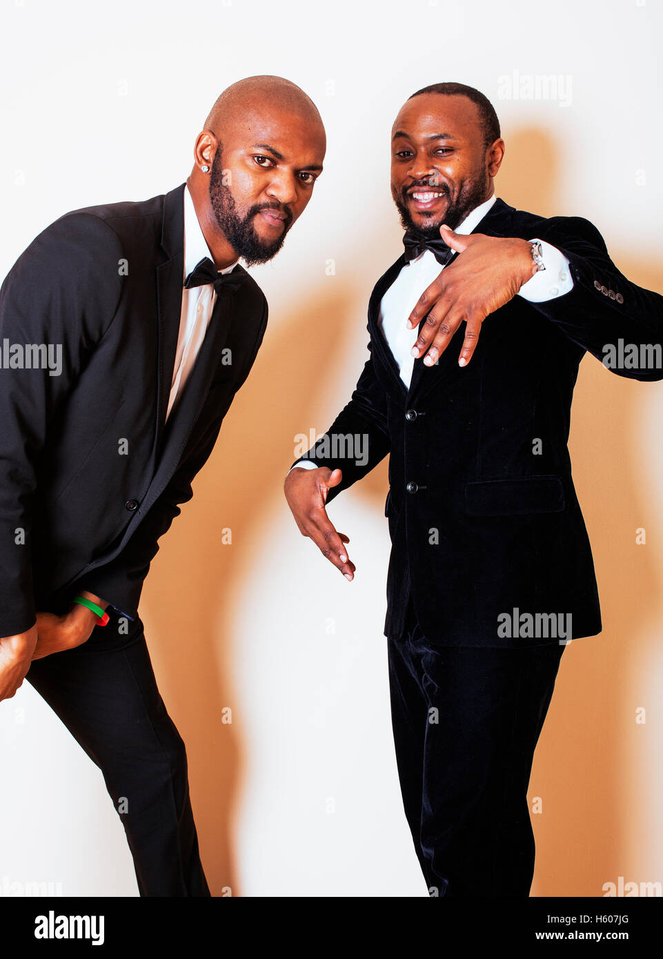 two afro-american businessmen in black suits emotional posing, g Stock ...