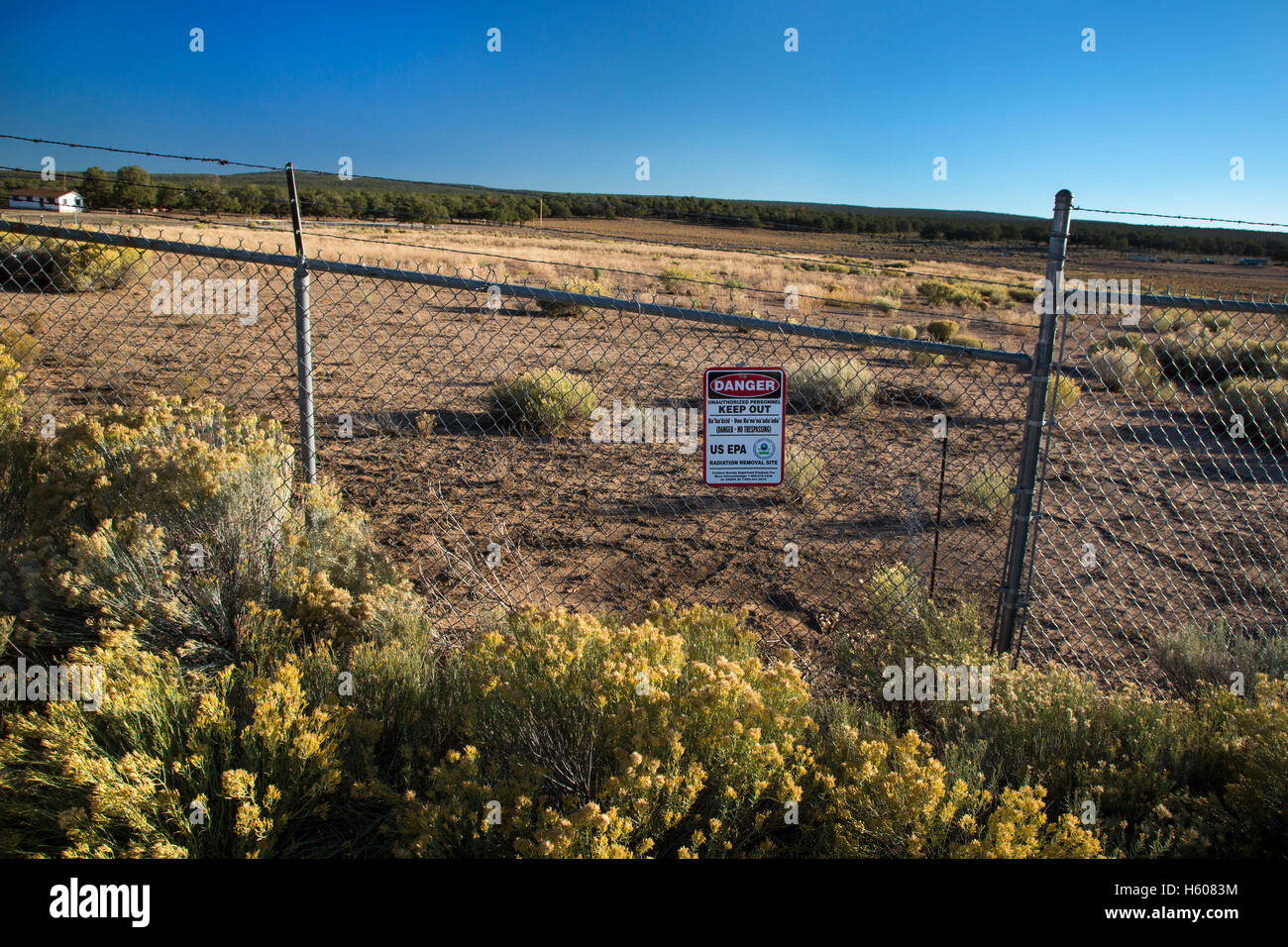 Mariano Lake, New Mexico - A sign warns of radiation danger on the site of an abandoned uranium mine on the Navajo Nation. Stock Photo
