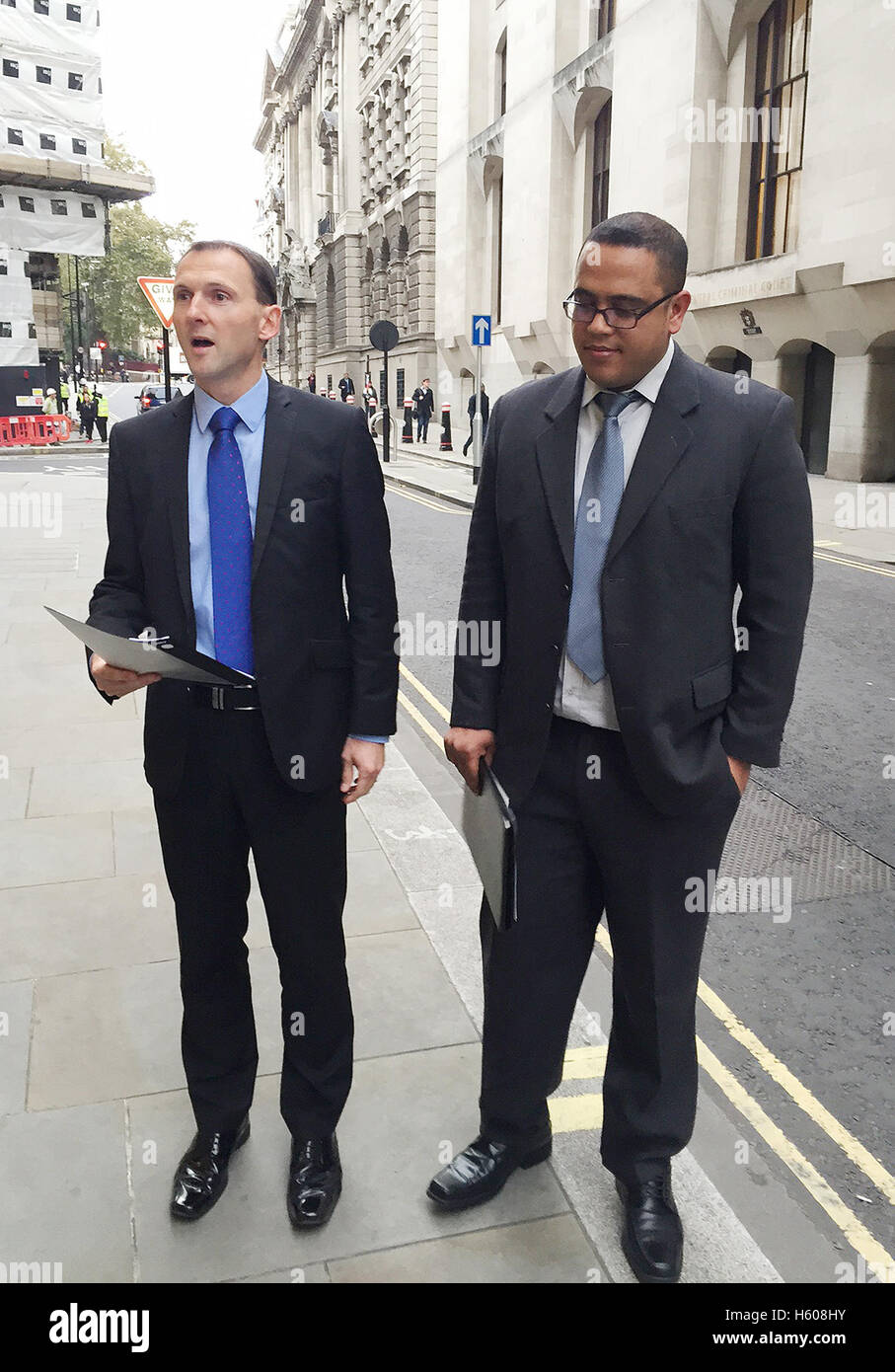 Detective Superintendent Ian Hunter (left), of Thames Valley Police, and Sarah Dahane's father Nabil Dahane speak outside the Old Bailey in London, after Angela Whitworth, was jailed for life for murdering their 20-month-old daughter over a bitter custody battle. Stock Photo