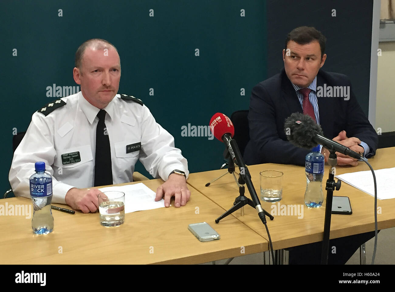 Chief Inspector Norman Haslett, PSNI commander for west Belfast (left