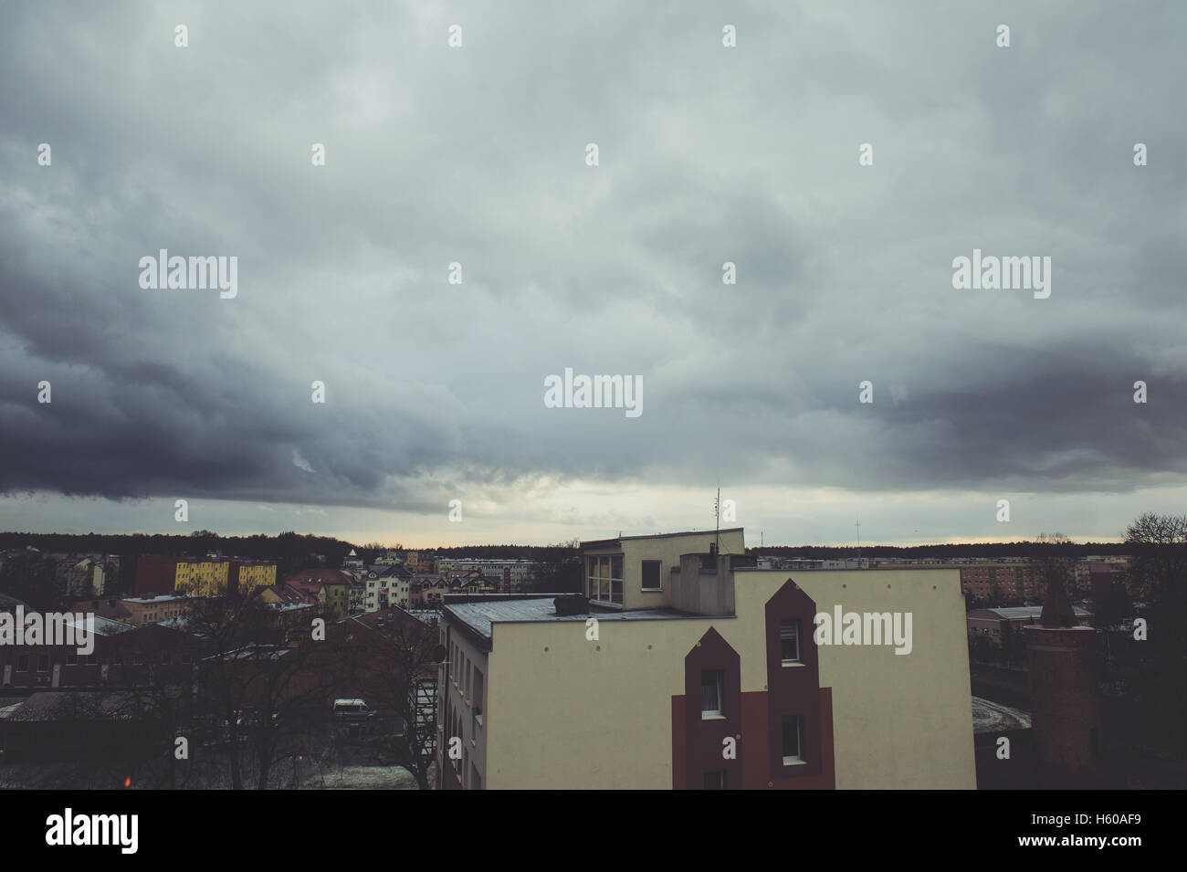 Dramatic dark storm clouds over the city Stock Photo - Alamy