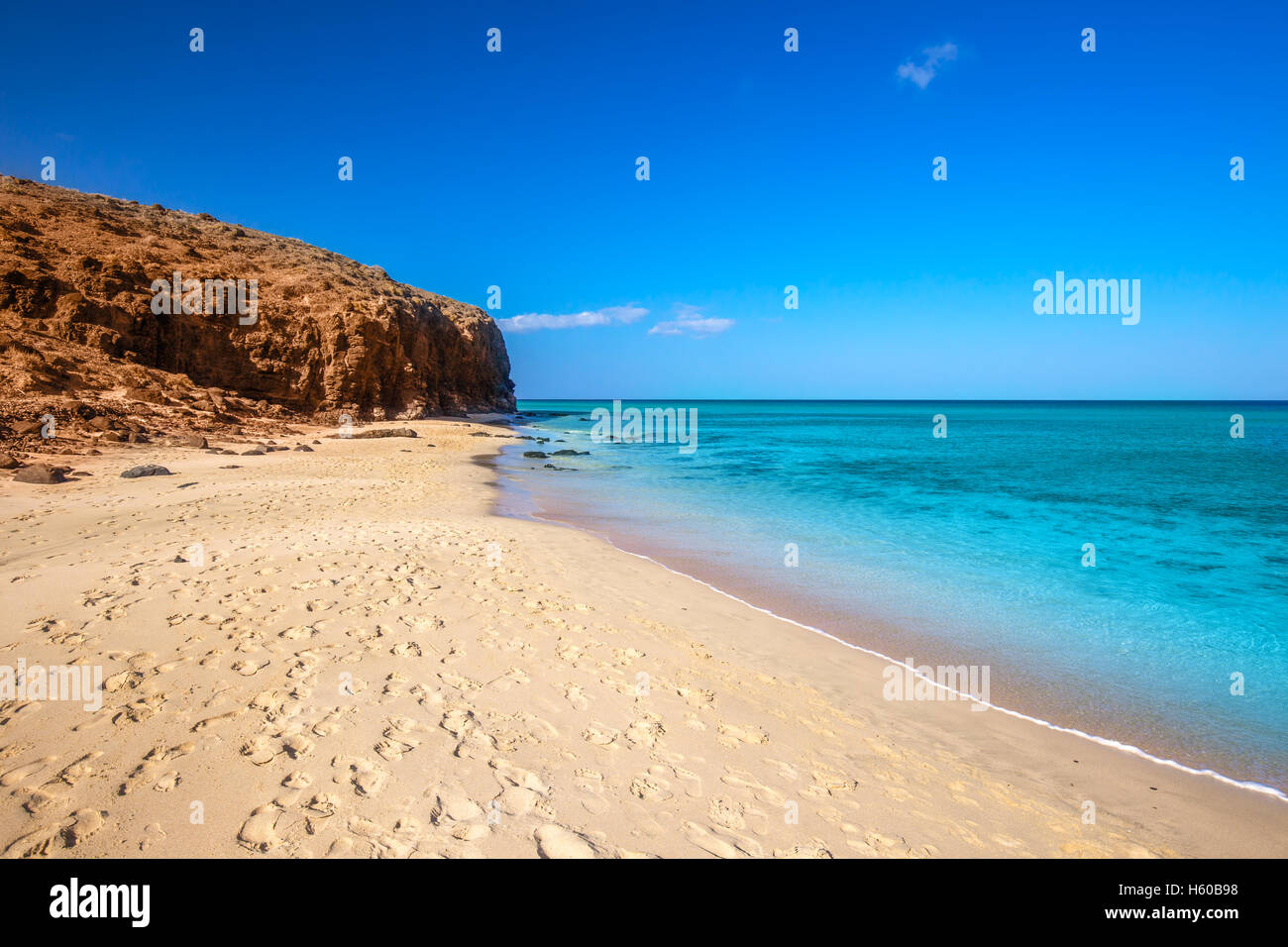 Sandy beach Mal Nobre with vulcanic mountains, Jandia, Fuerteventura island, Canary Islands, Spain Stock Photo
