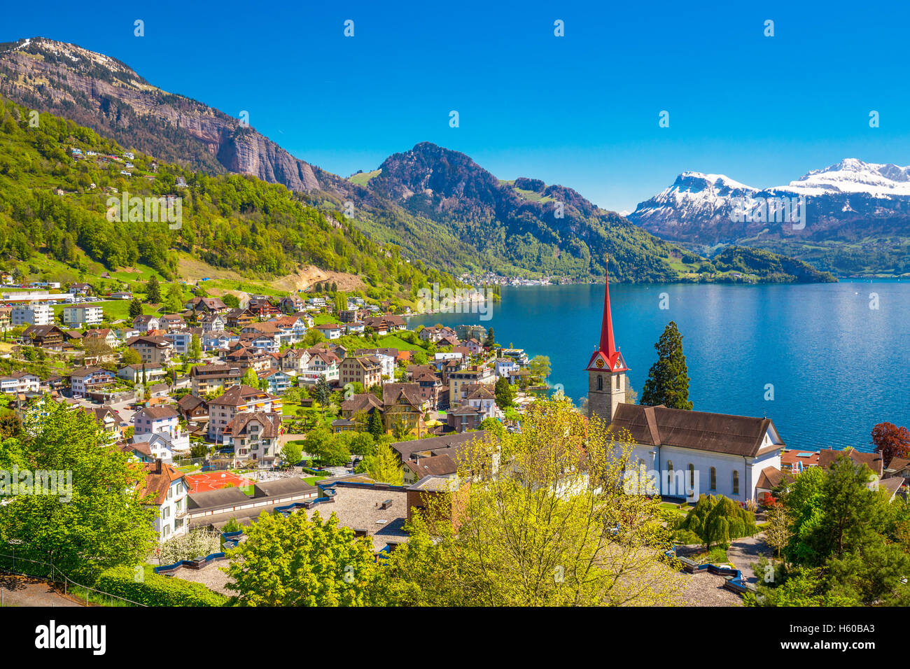 Village Weggis, lake Lucerne and Swiss Alps in the background near famous Lucerne town