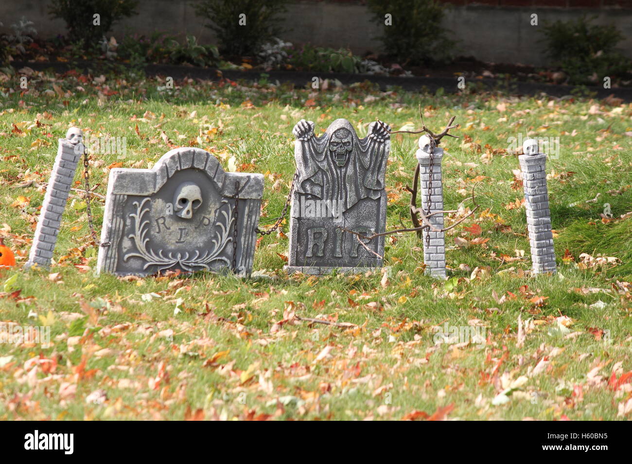 Decorative, plastic, tombstones, depicting a graveyard, for Halloween Stock  Photo - Alamy