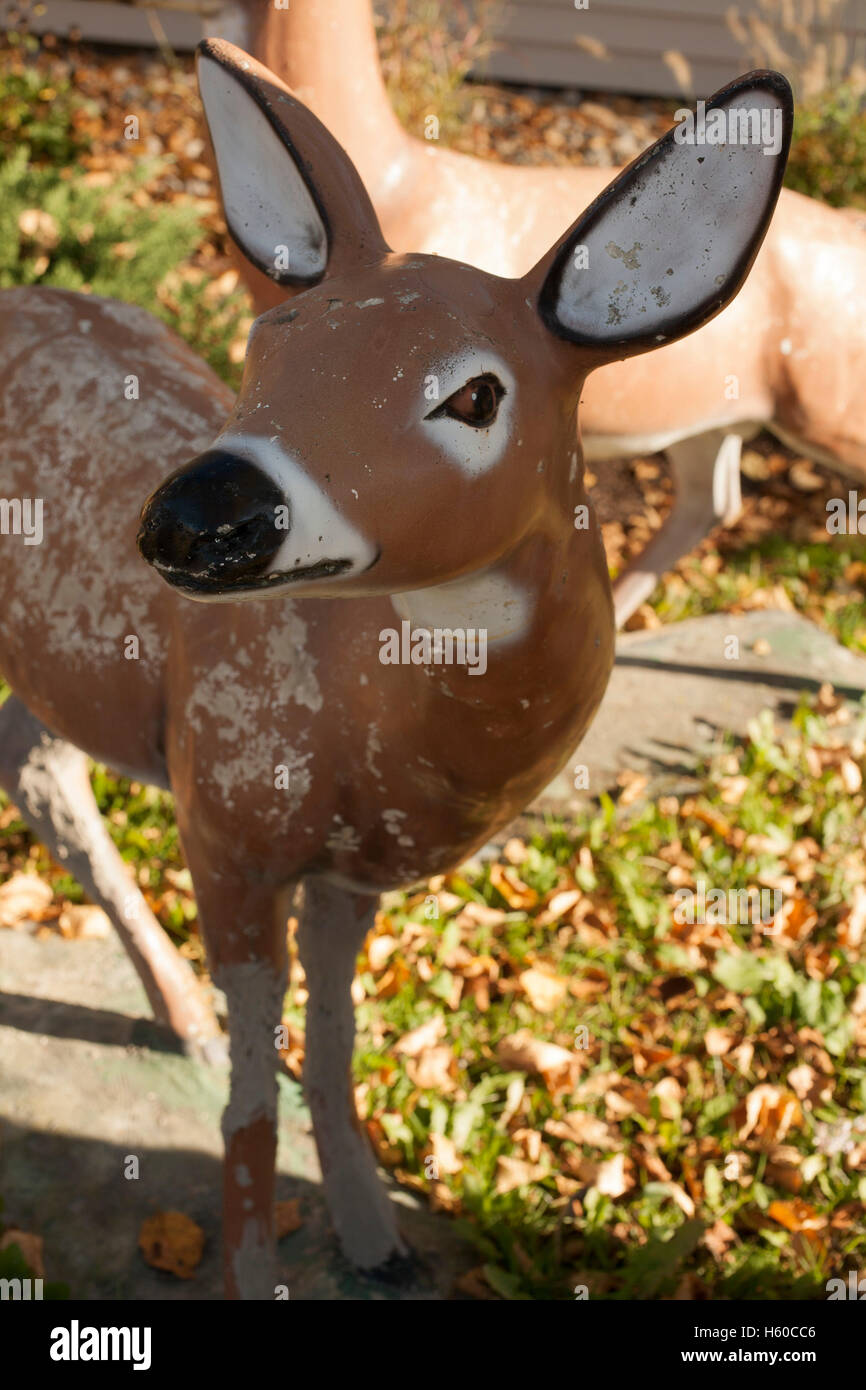Cement deer decorates a lawn Stock Photo Alamy