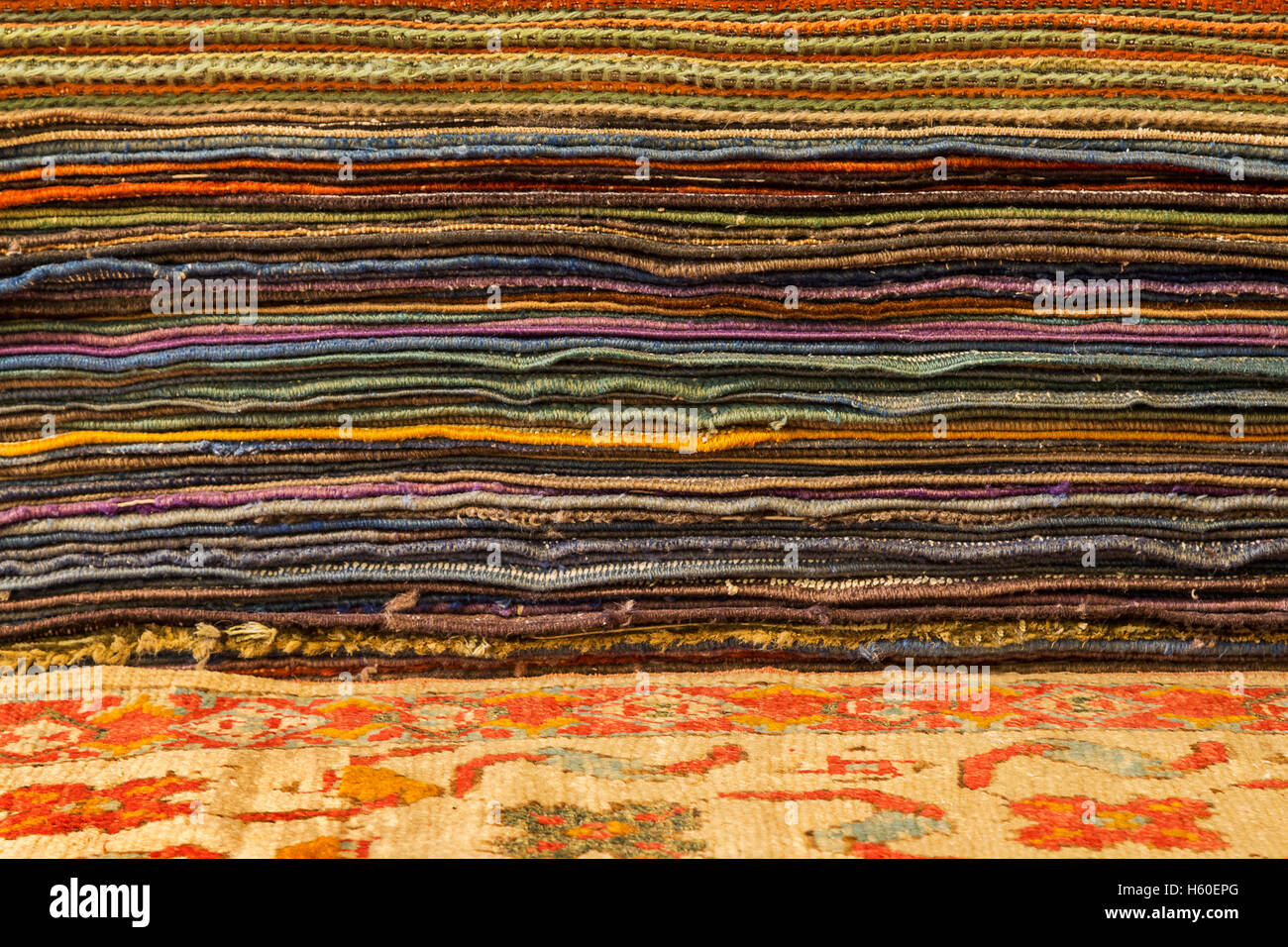 Stack of oriental carpets and rugs, Turkey Stock Photo