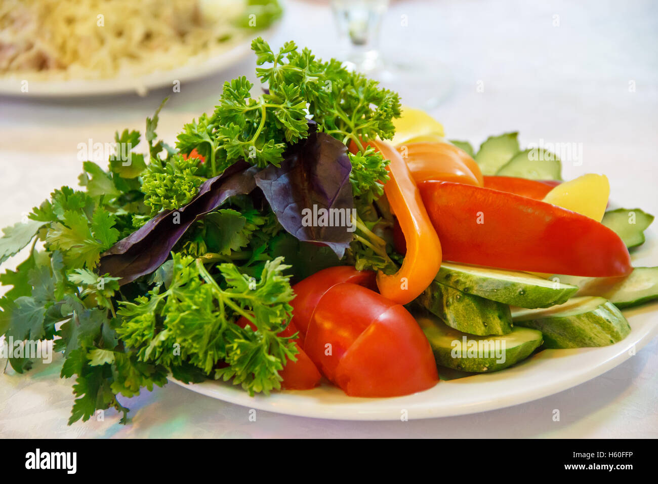 Fresh and healthy raw food on white plate Stock Photo