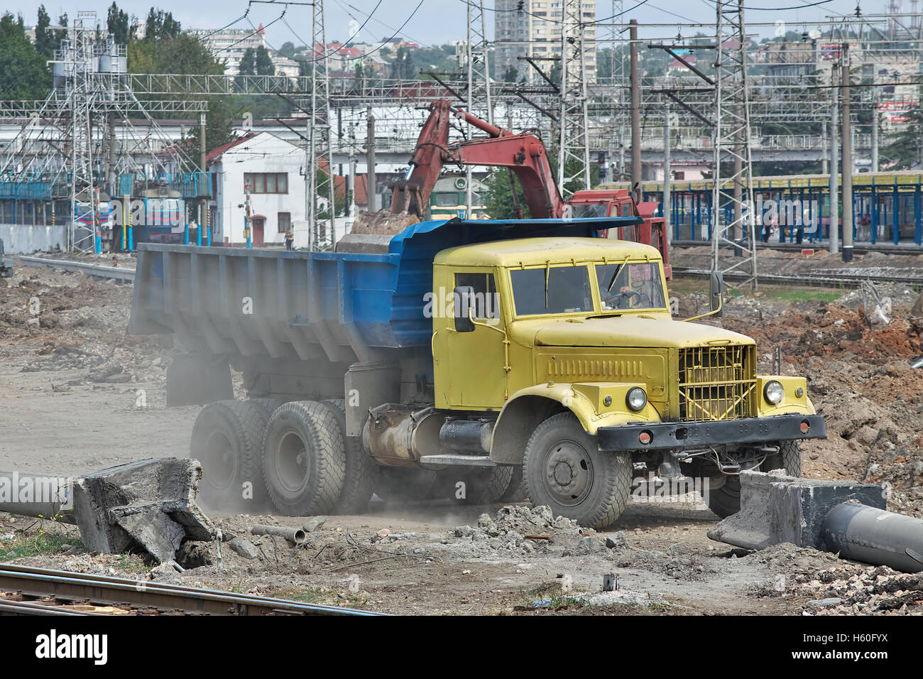 Simferopol, Ukraine - September 13, 2010: Old dump KrAZ-256 on the construction site being loaded Stock Photo