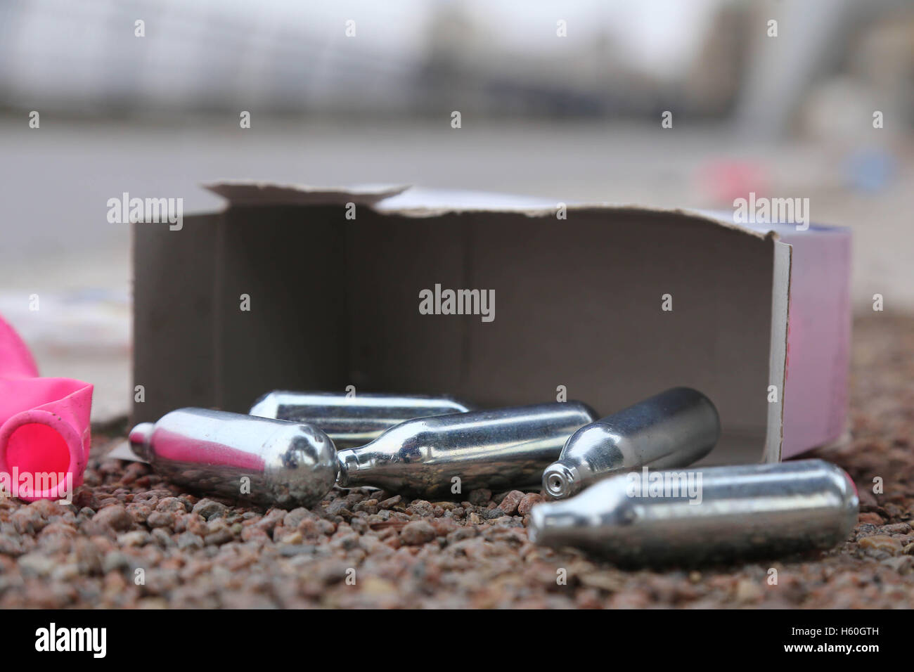 Nitrous Oxide canisters, balloons and boxes litter the Thames Path