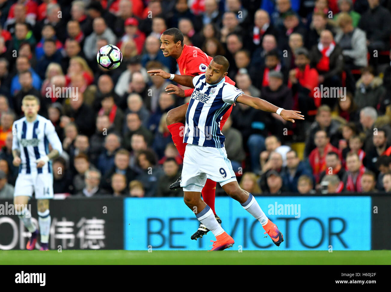 Liverpool's Joel Matip (back) and West Bromwich Albion's Jose Salomon Rondon battle for the ball during the Premier League match at Anfield, Liverpool. Stock Photo