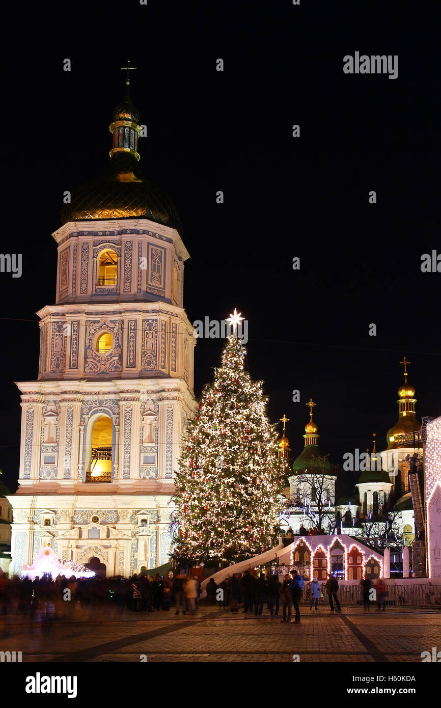 St. Sophia Cathedral, Christmas market, and main Kyiv's New Year tree on Sophia Square in Kyiv, Ukraine Stock Photo