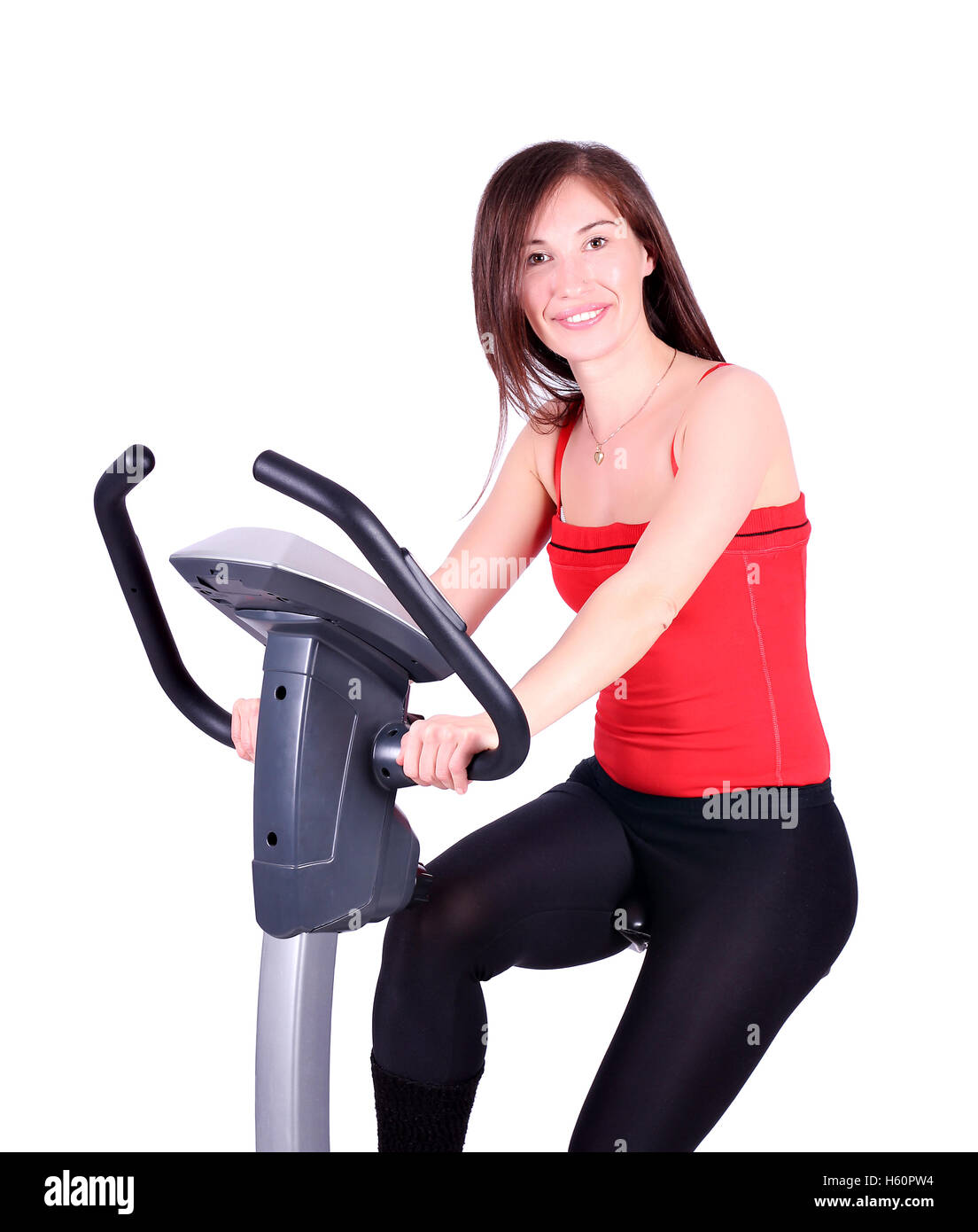 girl exercise with fitness cross trainer Stock Photo