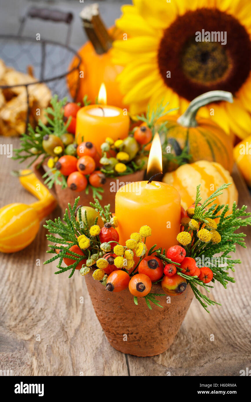 Beautiful decoration with candle and autumn plants. Table decor Stock ...