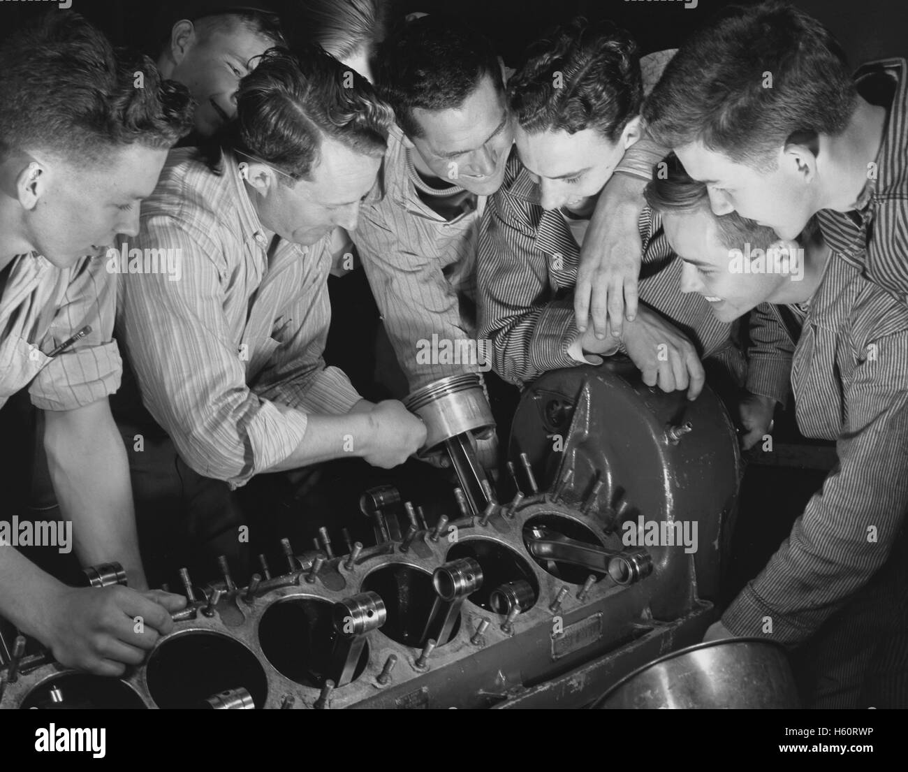 High School Boys and Instructors, Aircraft Construction Class during WWII, De Land, Florida, USA, Howard R. Hollem for Office of War Information, April 1942 Stock Photo