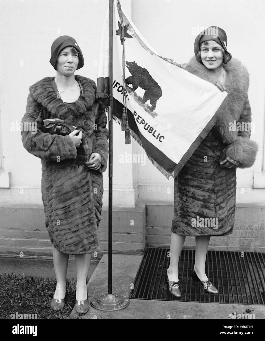 Two Young Women Presenting California State Flag to U.S. President Herbert  Hoover, Washington DC, USA, National Photo Company, March 1929 Stock Photo  - Alamy