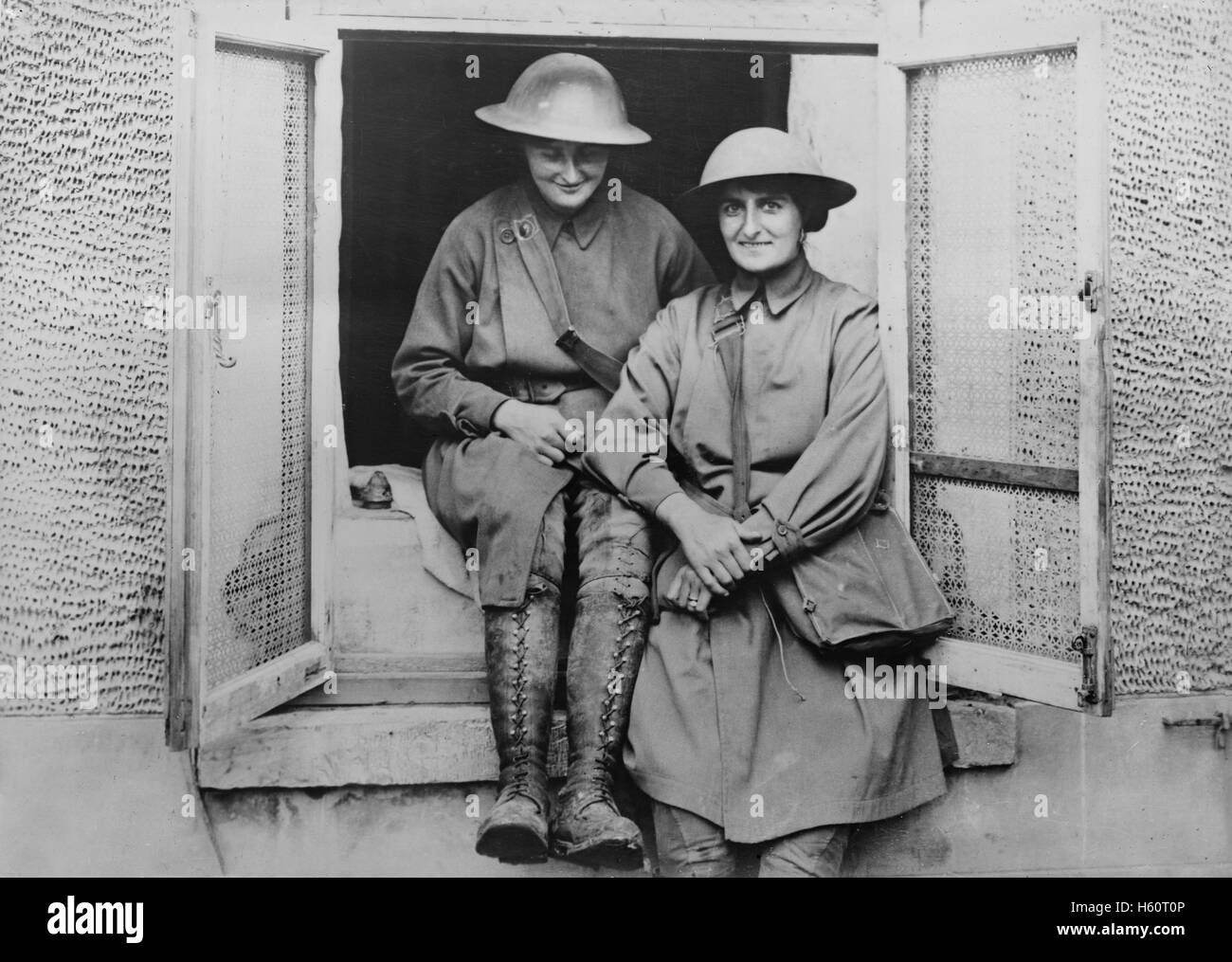 Elsie Knocker and Mairi Chisholm, Women's Emergency Corps, Portrait wearing their Ambulance Driver Uniforms and Helmets during World War I, West Flanders, Belgium, July 1917 Stock Photo