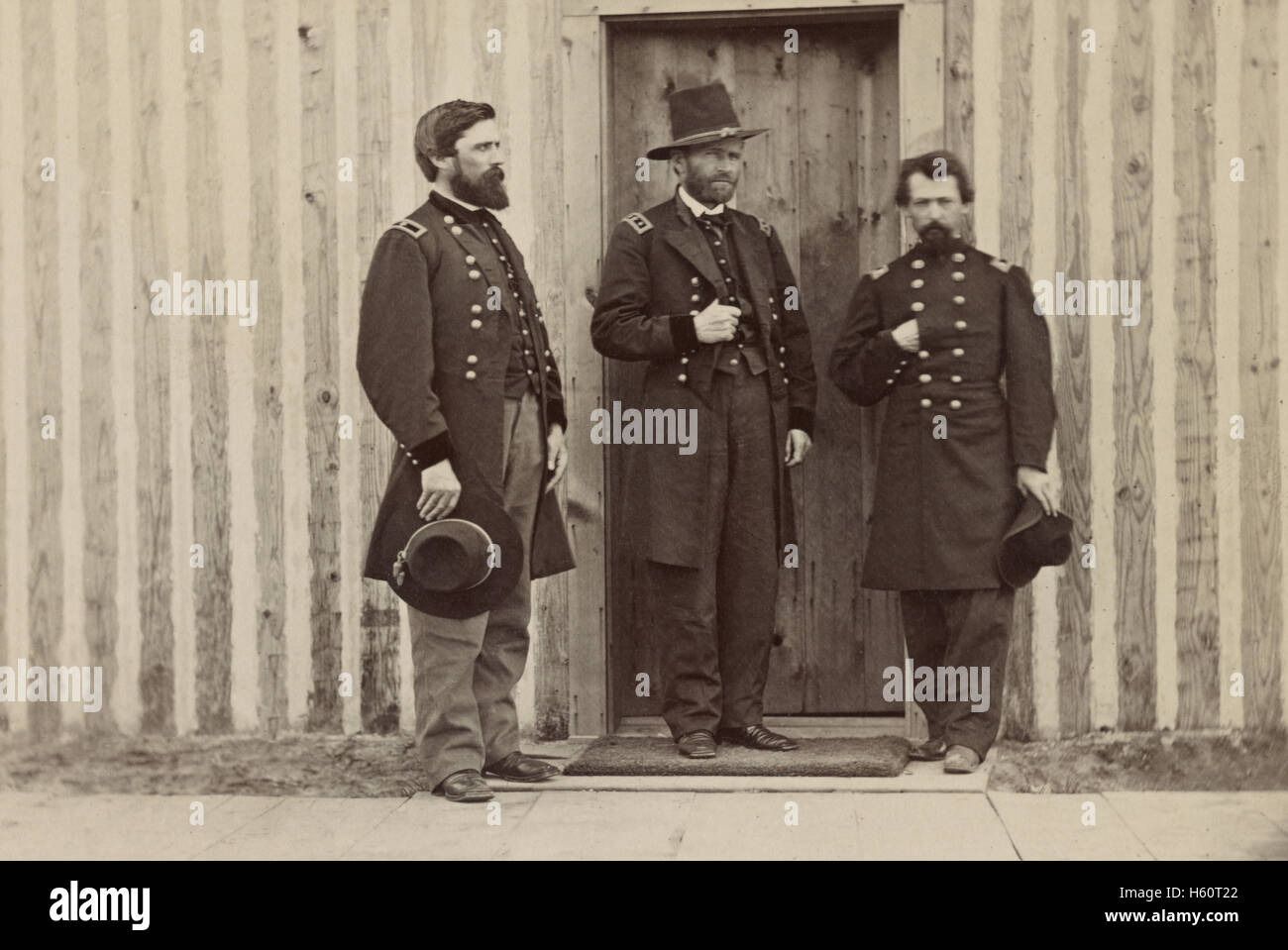 General John A. Rawlins, left, General Ulysses S. Grant, center, and Unidentified Officer, Portrait, 1861 Stock Photo