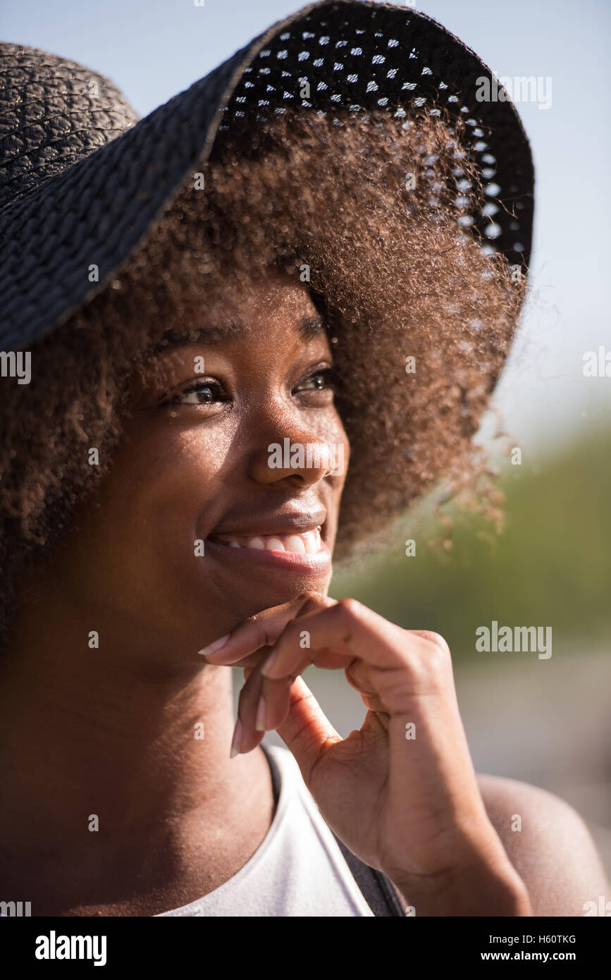Close up portrait of a beautiful young african american woman smiling ...