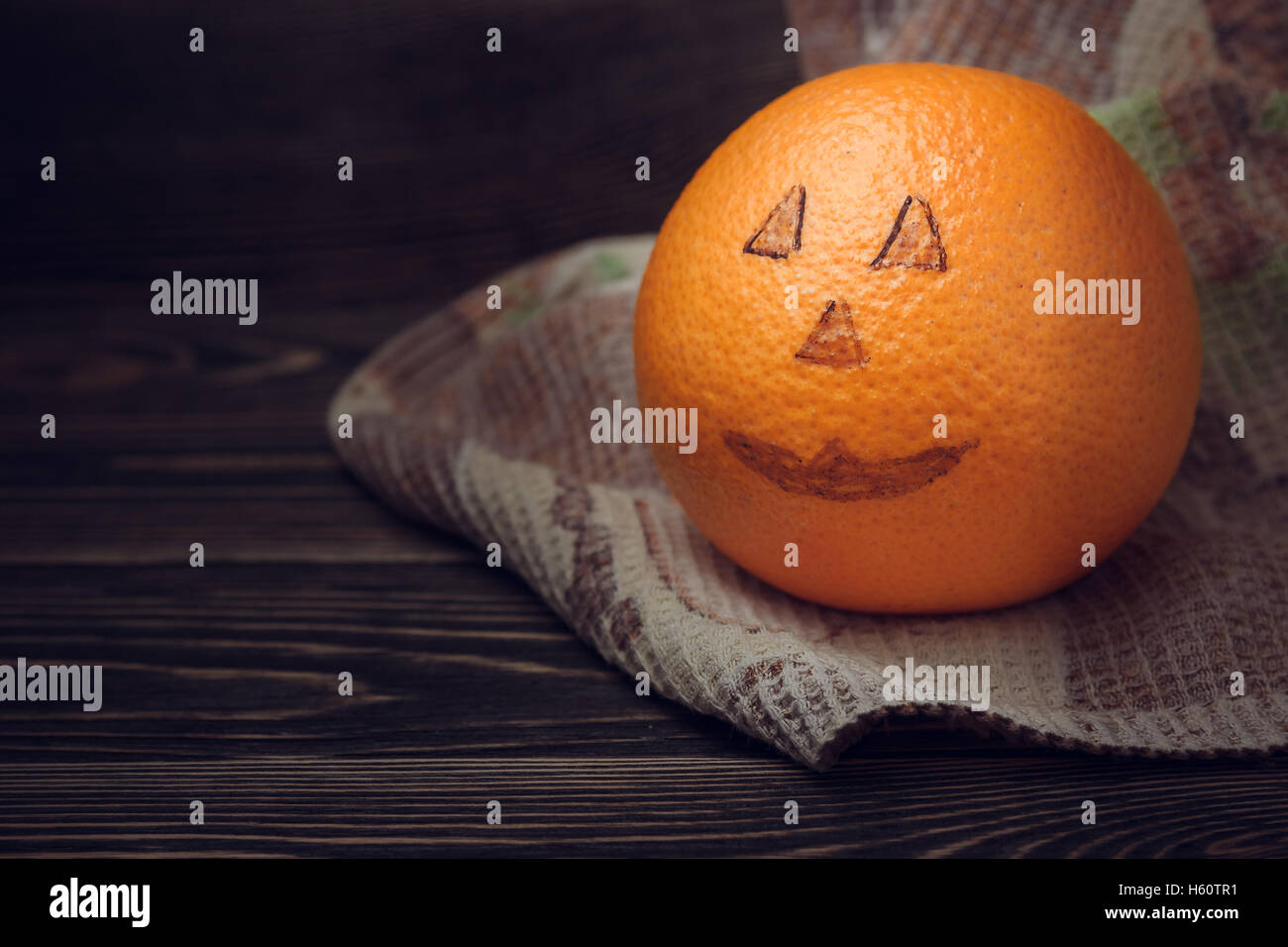 Halloween still life with orange Stock Photo