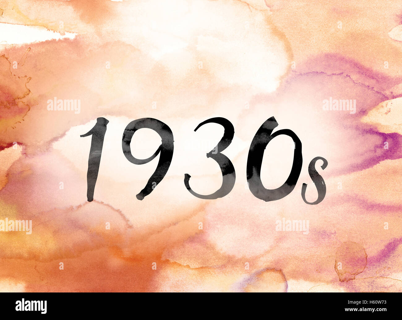 The word '1930s' painted in black ink over a colorful watercolor washed background concept and theme. Stock Photo