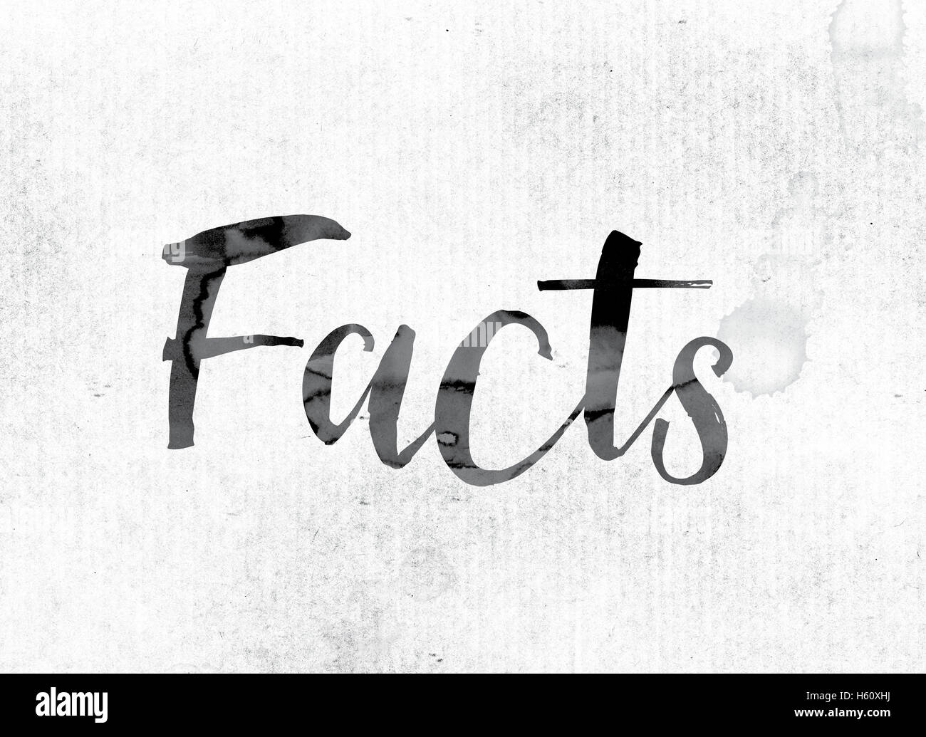 The word "Facts" concept and theme painted in watercolor ink on a white