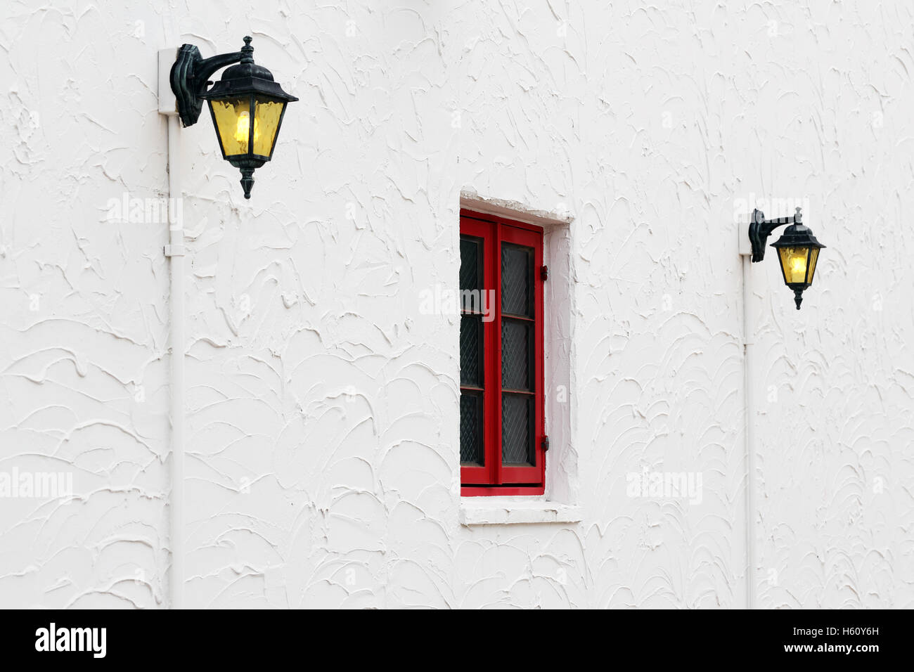 Vintage red window with old lamp on the white wall Stock Photo - Alamy