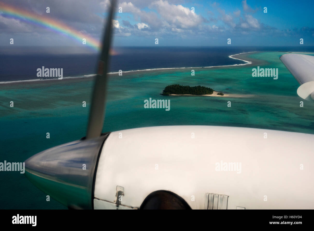 Aitutaki. Cook Island. Polynesia. South Pacific Ocean. A plane flies over the islands between the Aitutaki Island and Atiu Islan Stock Photo