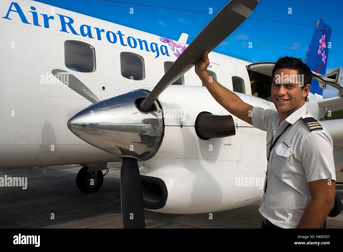 Atiu Island. Cook Island. Polynesia. South Pacific Ocean. The pilot plane of Air Rarotonga poses with the aircraft. Air Rarotong Stock Photo