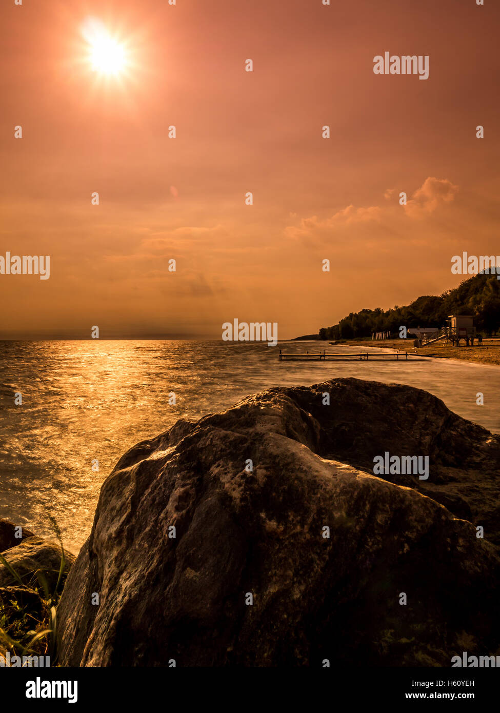 Sun rising over the seashore Stock Photo