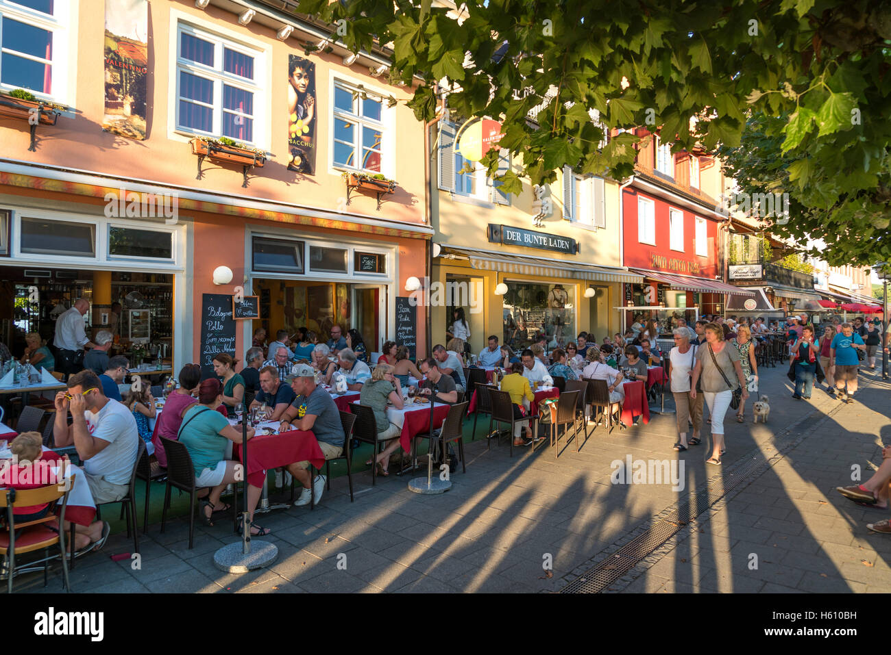 crowded restaurants at the lake promenade  in Meersburg at Lake Constance,  Baden-Württemberg, Germany, Stock Photo