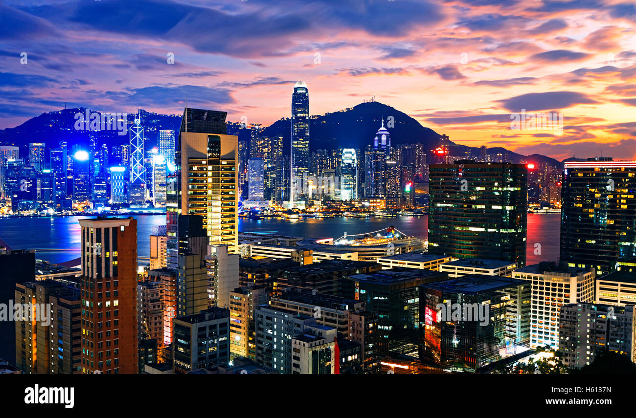 Hong Kong skyline at sunset Stock Photo - Alamy