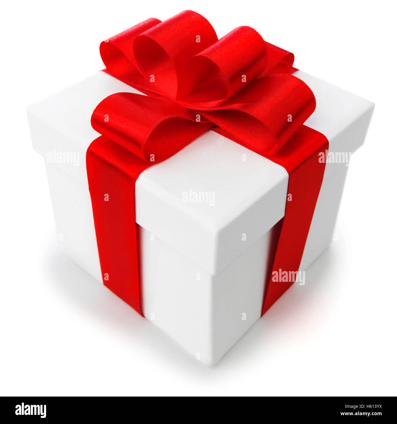 White gift box with red ribbon bow hi-res stock photography and images ...