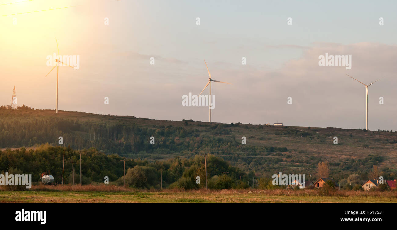 wind turbines on mountain at the sunset Stock Photo - Alamy