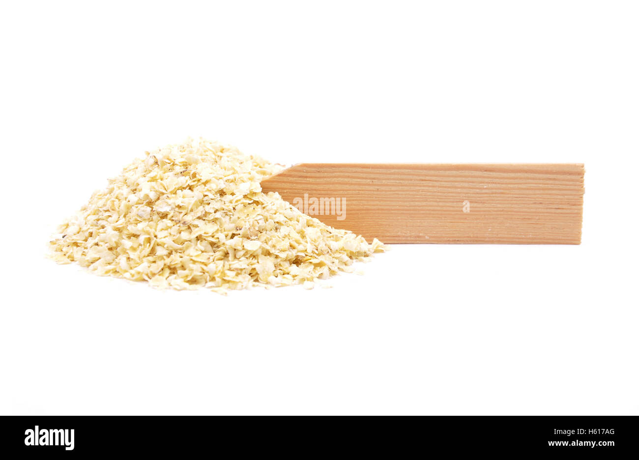 Millet flakes at plate Stock Photo