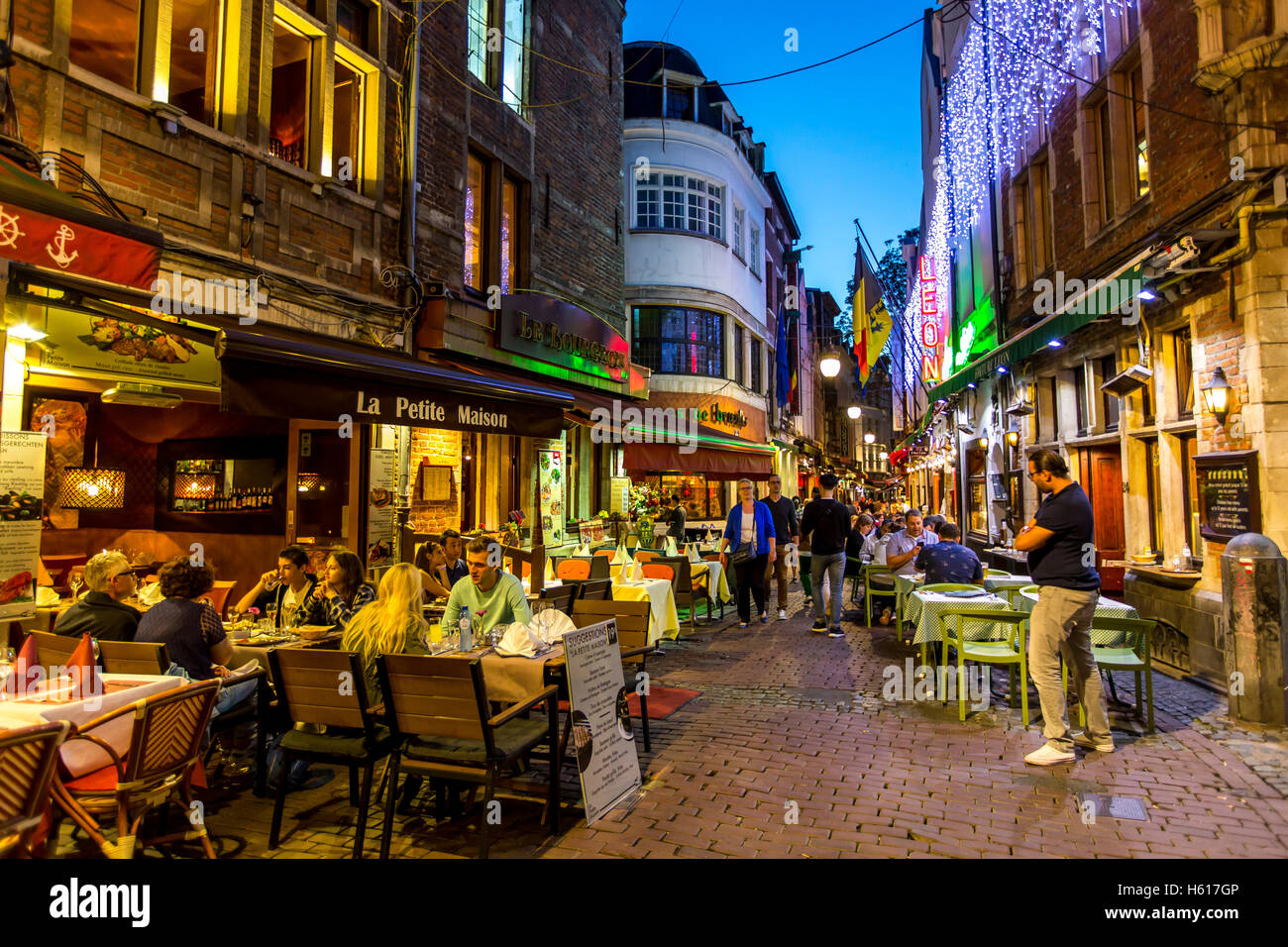 Restaurants, bars, cafes in the old town streets near the Grand Place, food lane,  Brussels, Belgium, Stock Photo