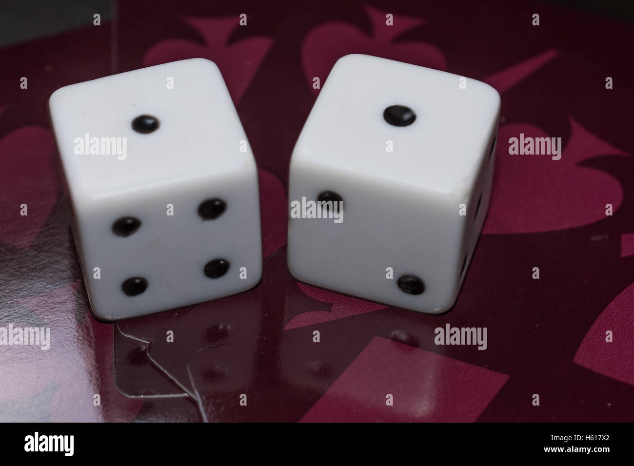 Snake eyes and playing cards Stock Photo Alamy