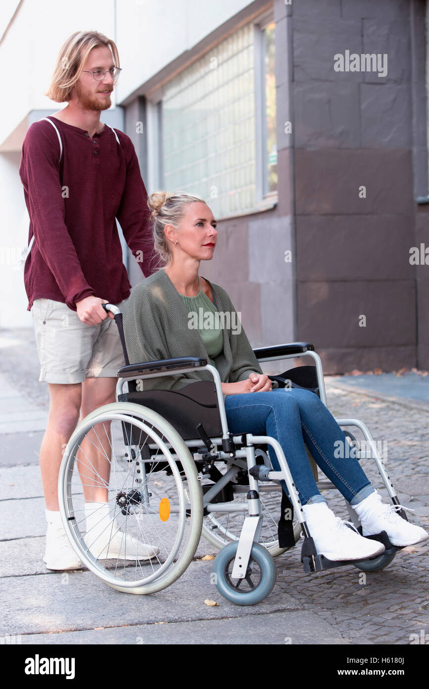 Woman in wheelchair hi-res stock photography and images - Alamy
