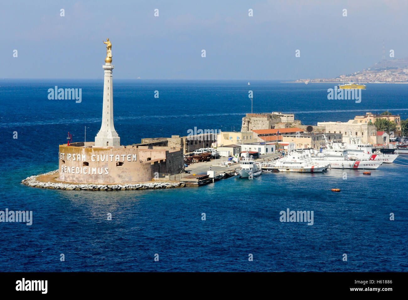 Statue of the golden Madonna at the entrance to Messina harbour,  Sicily, Italy Stock Photo