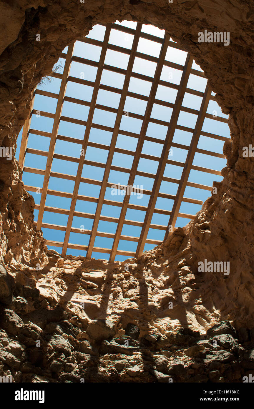 Fuerteventura, Canary Islands, North Africa, Spain: the cover grille of the caves of Ajuy seen from one of the tunnels of the footpath Stock Photo