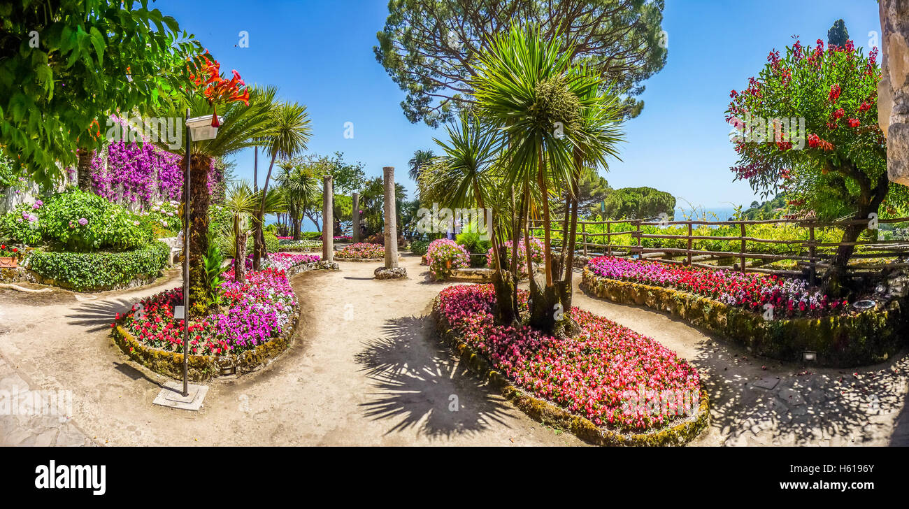 Scenic picture-postcard view of famous Villa Rufolo gardens in Ravello at Amalfi Coast with Gulf of Salerno, Campania, Italy Stock Photo
