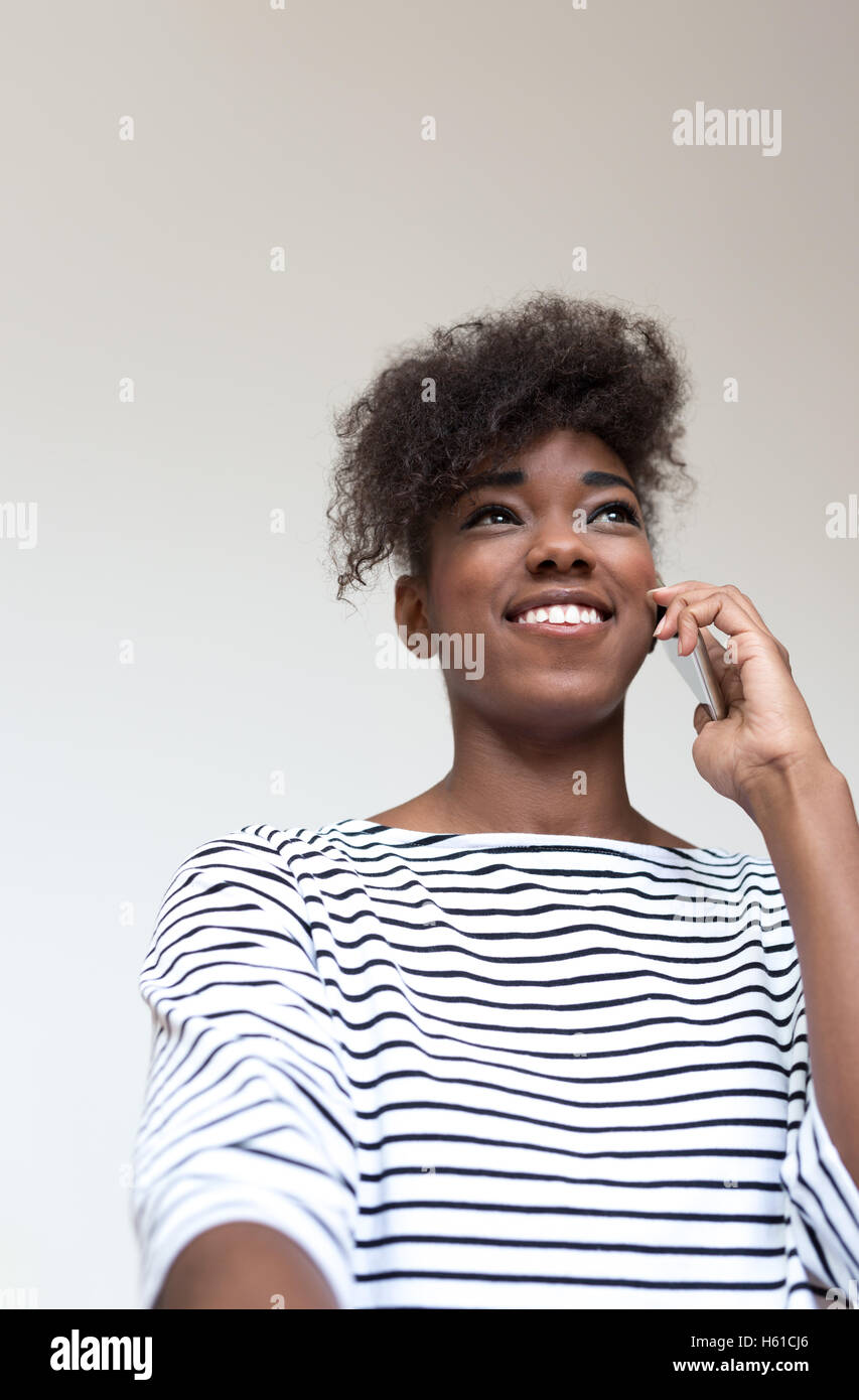 Portrait of a young african american woman at home Stock Photo - Alamy